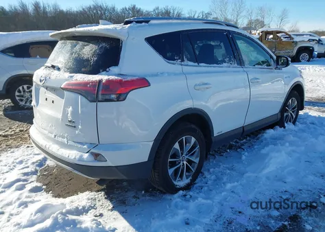 2016 Toyota Rav4 Hybrid Xle z USA, uszkodzony, nr VIN JTMRJREV2GD036949